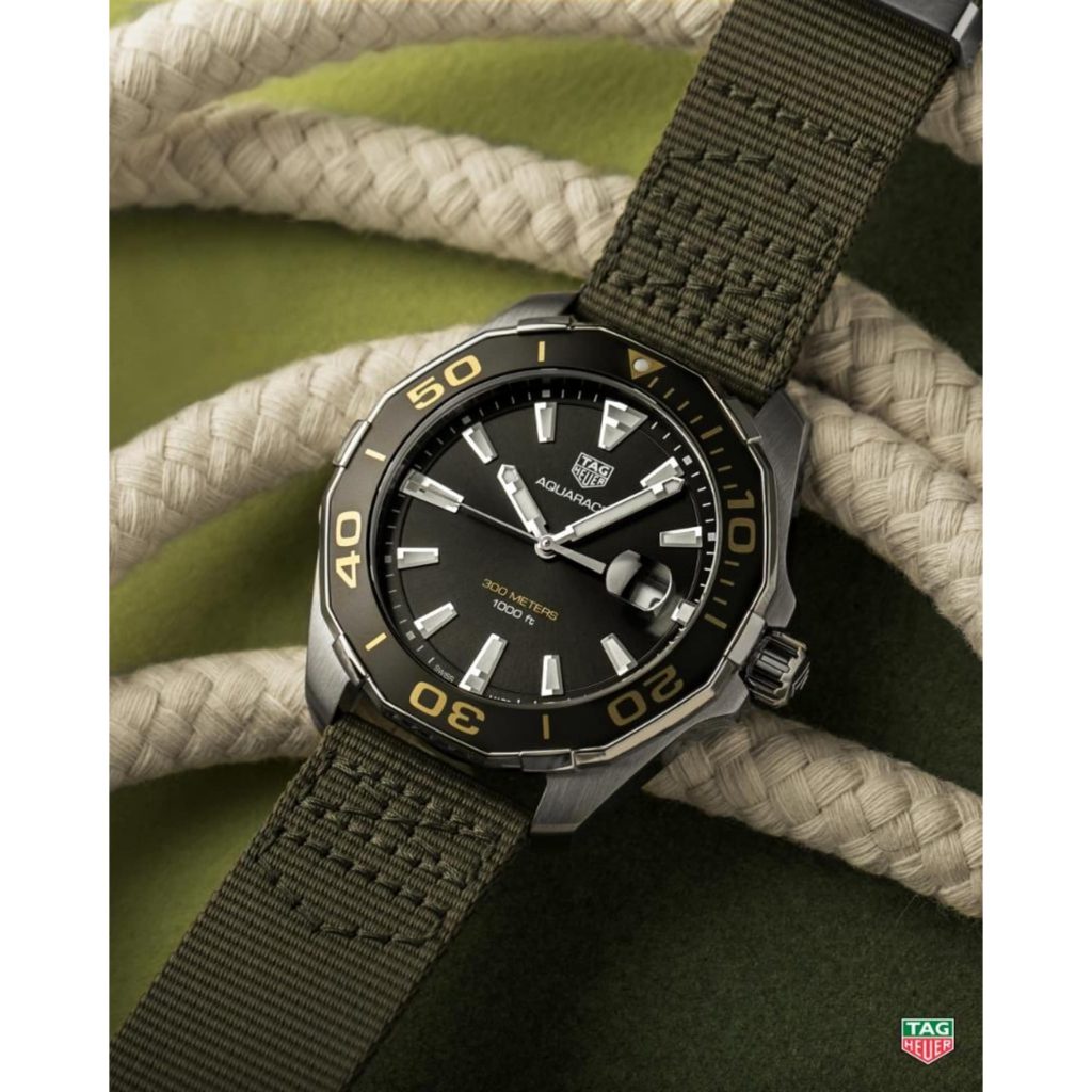 The male fake watch has Khaki green strap.